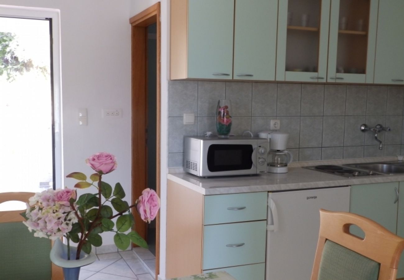 Appartement à Kampor - Appartement dans Kampor avec vue mer, terrasse, Climatisation, WIFI (4610-4)