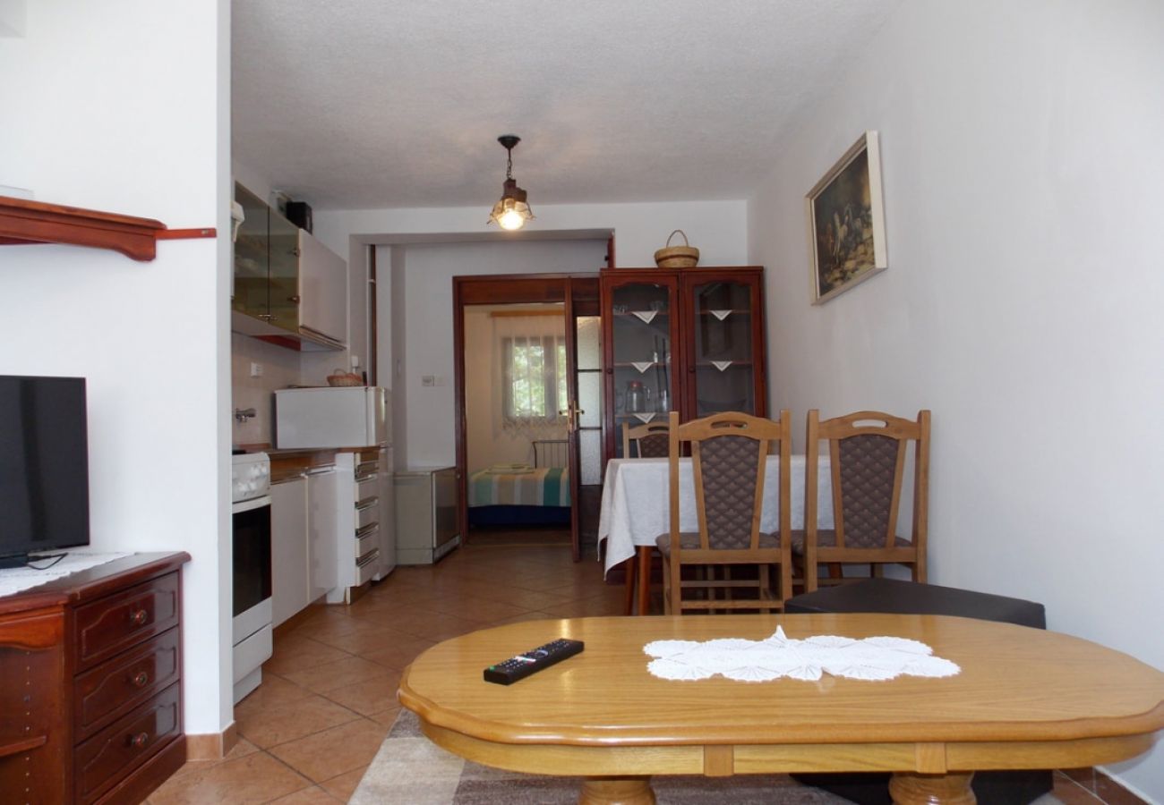 Appartement à Malinska - Appartement dans Malinska avec terrasse, WIFI, Machine à laver (4690-4)