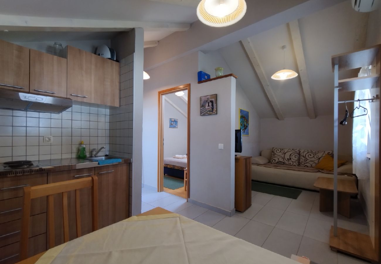 Appartement à Vinišce - Appartement dans Vinišće avec terrasse, Climatisation, WIFI (4756-2)