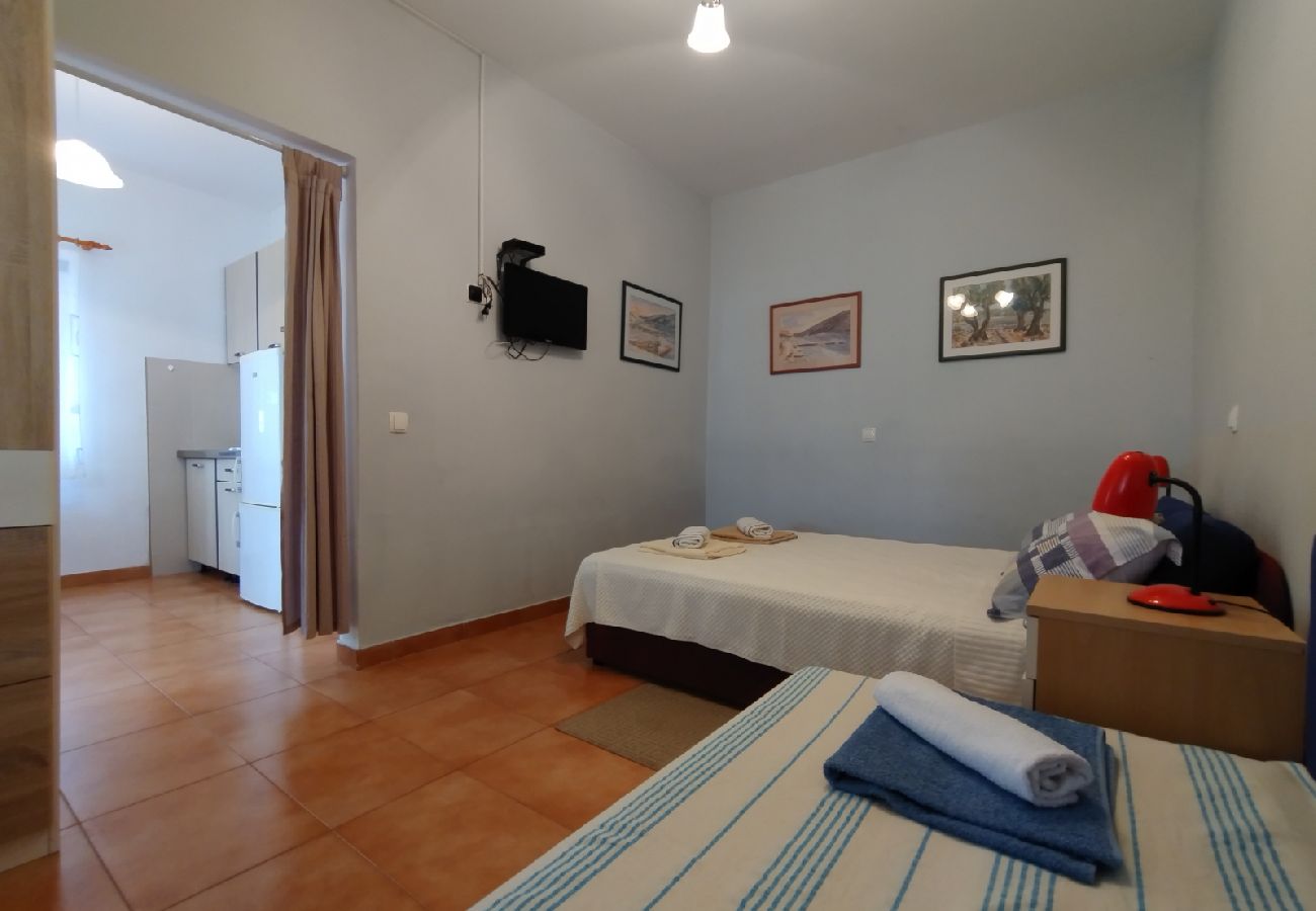 Appartement à Vinišce - Appartement dans Vinišće avec terrasse, Climatisation, WIFI (4756-1)