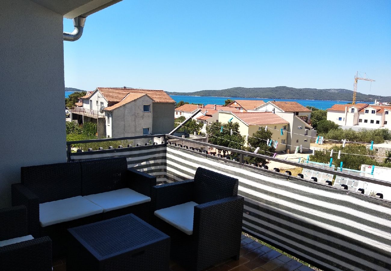 Appartement à Sibenik - Appartement dans Brodarica avec vue mer, Balcon, Climatisation, WIFI (4731-4)