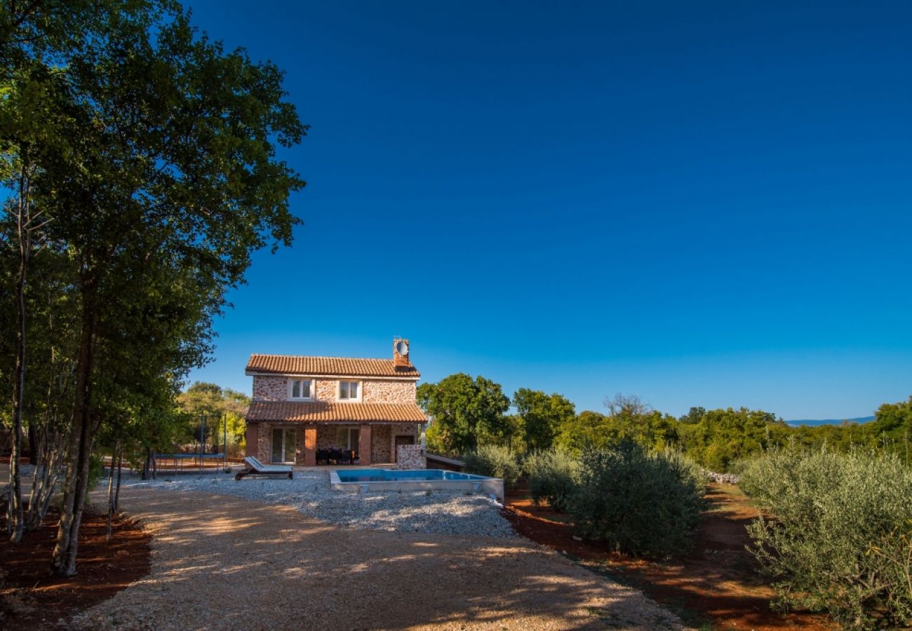 Maison à Vrbnik - Maison de vacances dans Vrbnik avec terrasse, Climatisation, WIFI, Machine à laver (4770-1)