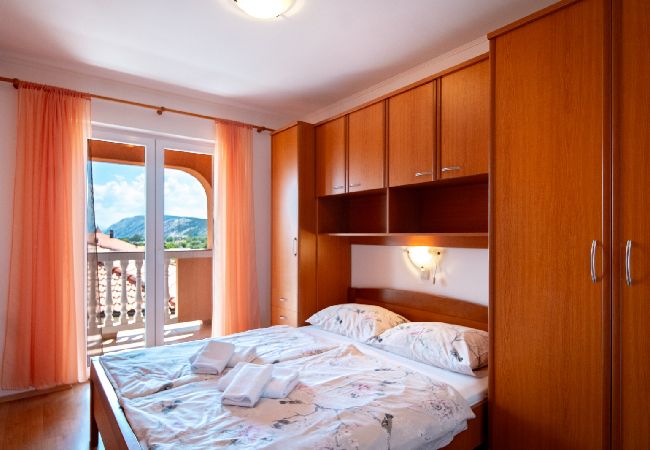 Appartement à Lopar - Appartement dans Lopar avec Balcon, Climatisation, WIFI, Machine à laver (4886-4) Appartement à Lopar - Appartement dans Lopar avec Balcon, Climatisation, WIFI, Machine à laver (4886-4)