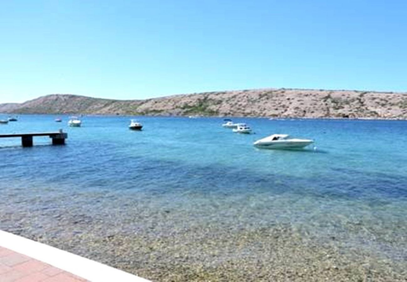 Appartement à Rab - Appartement dans Barbat avec vue mer, Climatisation, WIFI, Machine à laver (4956-1)