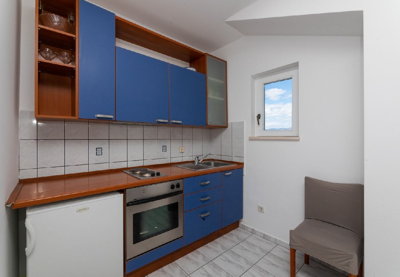 Appartement à Supetar - Appartement dans Supetar avec vue mer, terrasse, Climatisation, WIFI (3553-3)