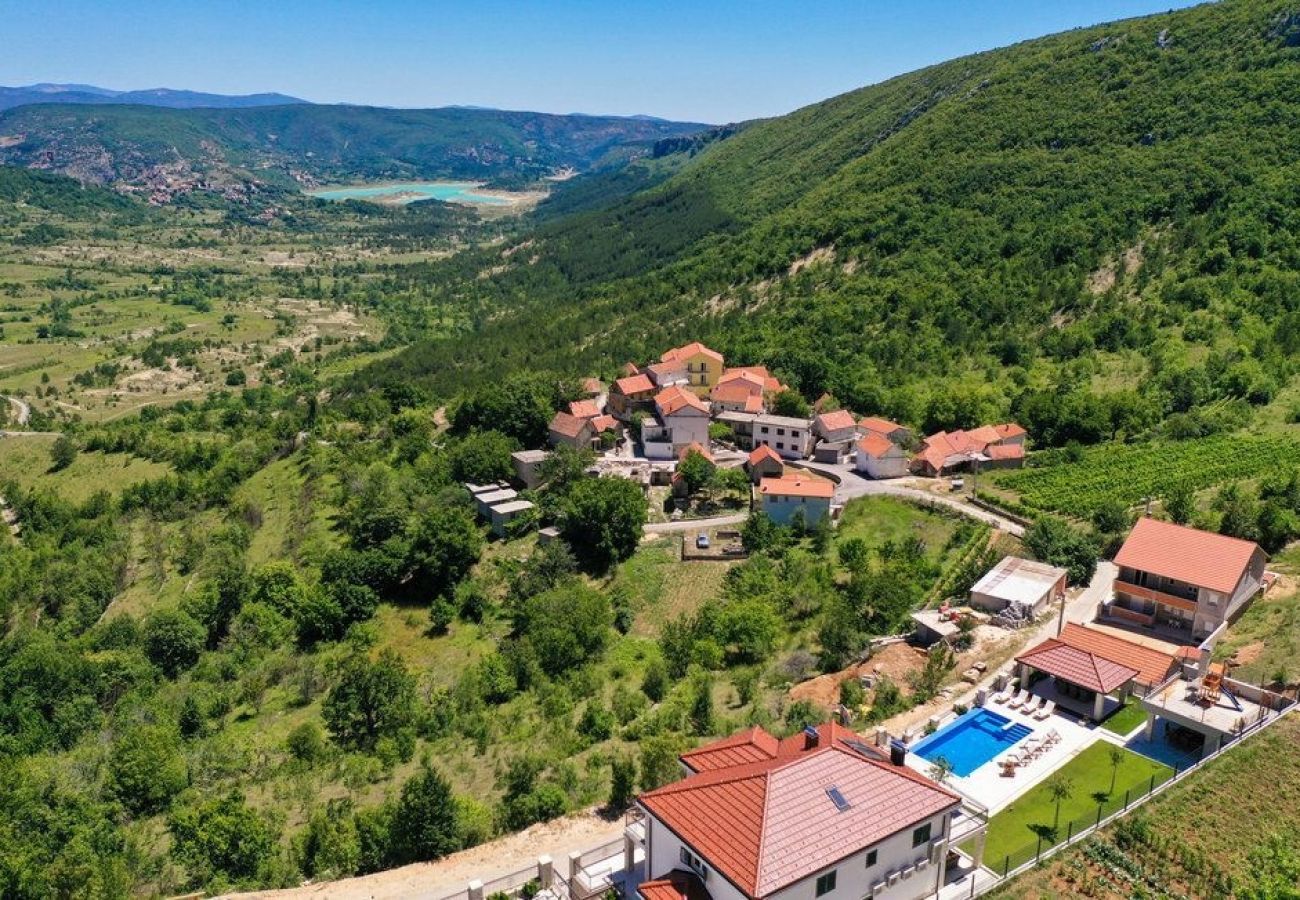 Maison à Imotski - Ferienhaus in Imotski mit Terrasse, Klimaanlage, W-LAN, Waschmaschine (4978-1)