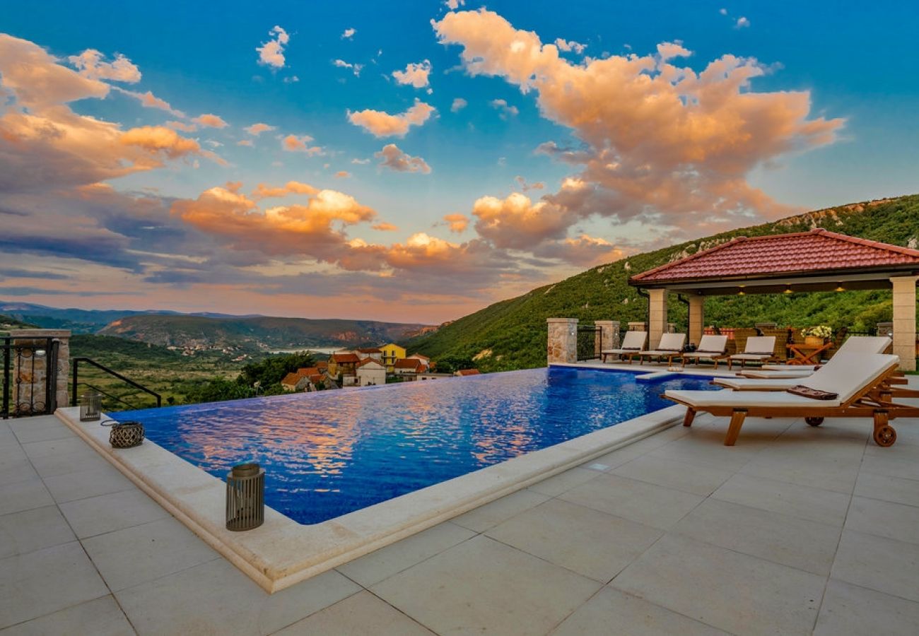 Maison à Imotski - Ferienhaus in Imotski mit Terrasse, Klimaanlage, W-LAN, Waschmaschine (4978-1)