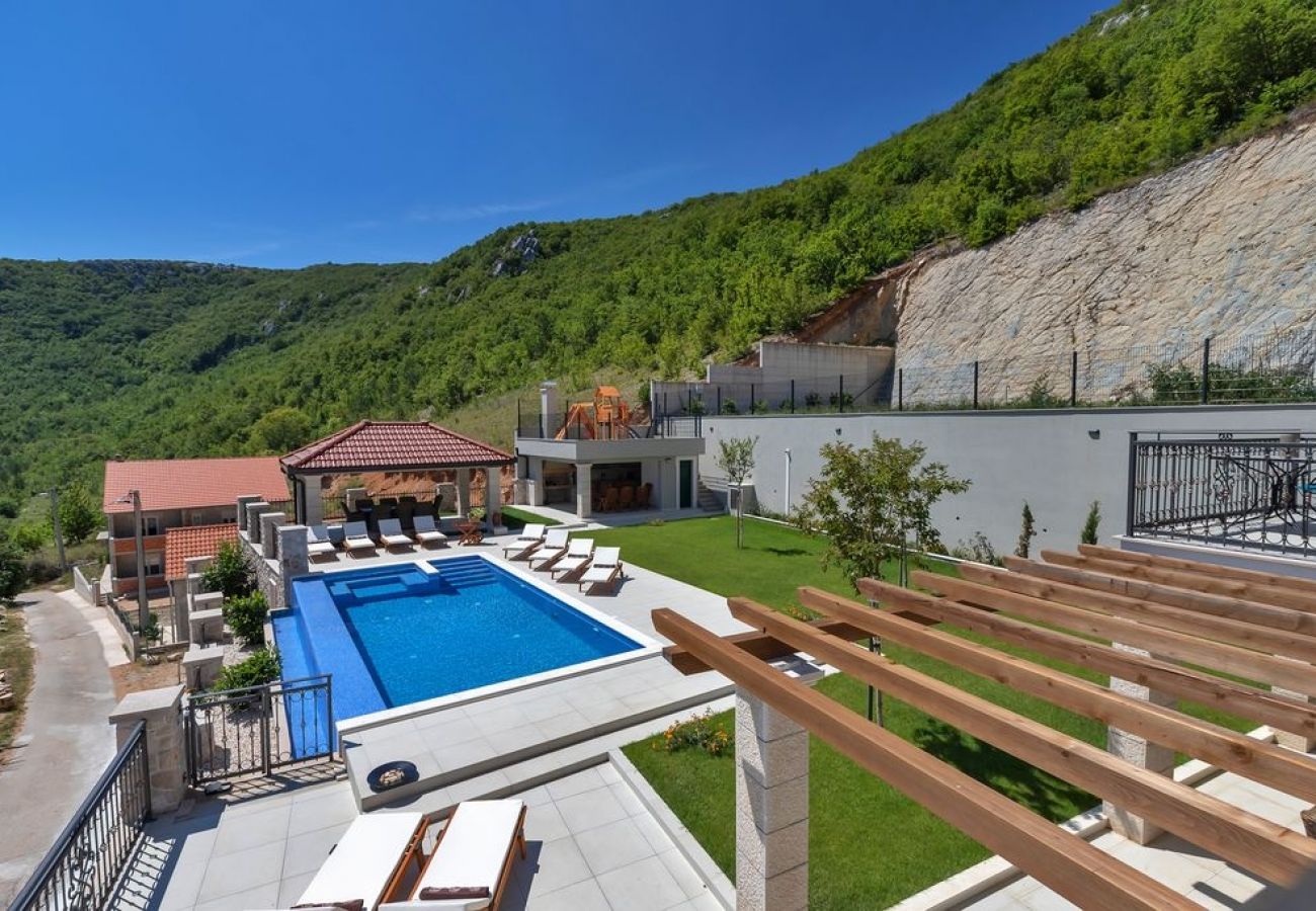 Maison à Imotski - Ferienhaus in Imotski mit Terrasse, Klimaanlage, W-LAN, Waschmaschine (4978-1)