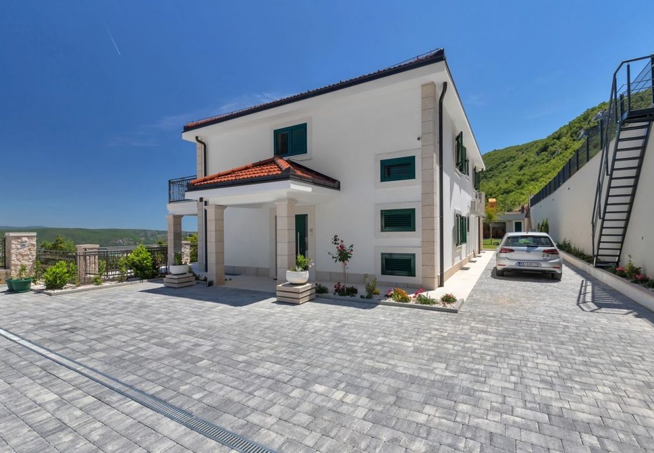 Maison à Imotski - Ferienhaus in Imotski mit Terrasse, Klimaanlage, W-LAN, Waschmaschine (4978-1)