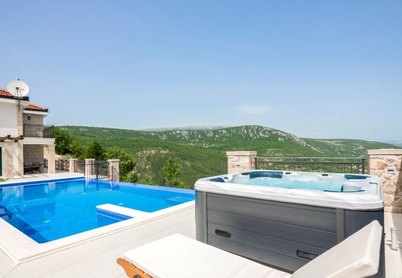 Maison à Imotski - Ferienhaus in Imotski mit Terrasse, Klimaanlage, W-LAN, Waschmaschine (4978-1)