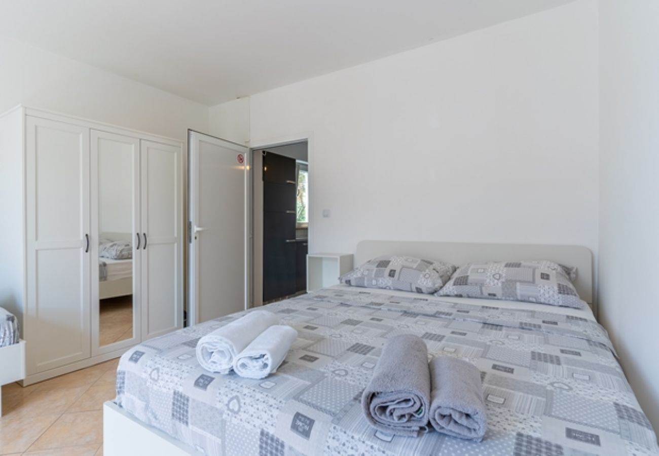 Appartement à Cres - Appartement dans Cres avec Balcon, Climatisation, WIFI, Machine à laver (4249-3)