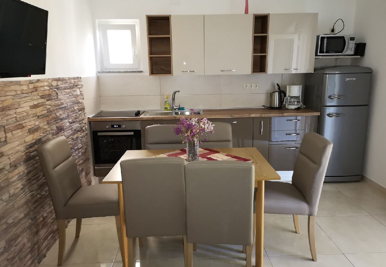 Appartement à Lopar - Appartement dans Lopar avec vue mer, terrasse, WIFI, Machine à laver (593-4)