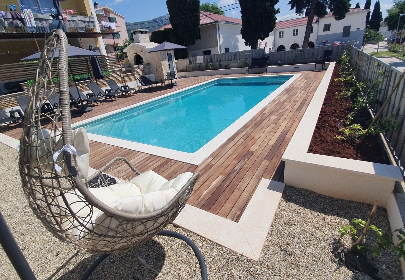 Appartement à Kaštel Lukšic - Appartement dans Kaštel Lukšić avec terrasse, Climatisation, WIFI, Machine à laver (5107-2)