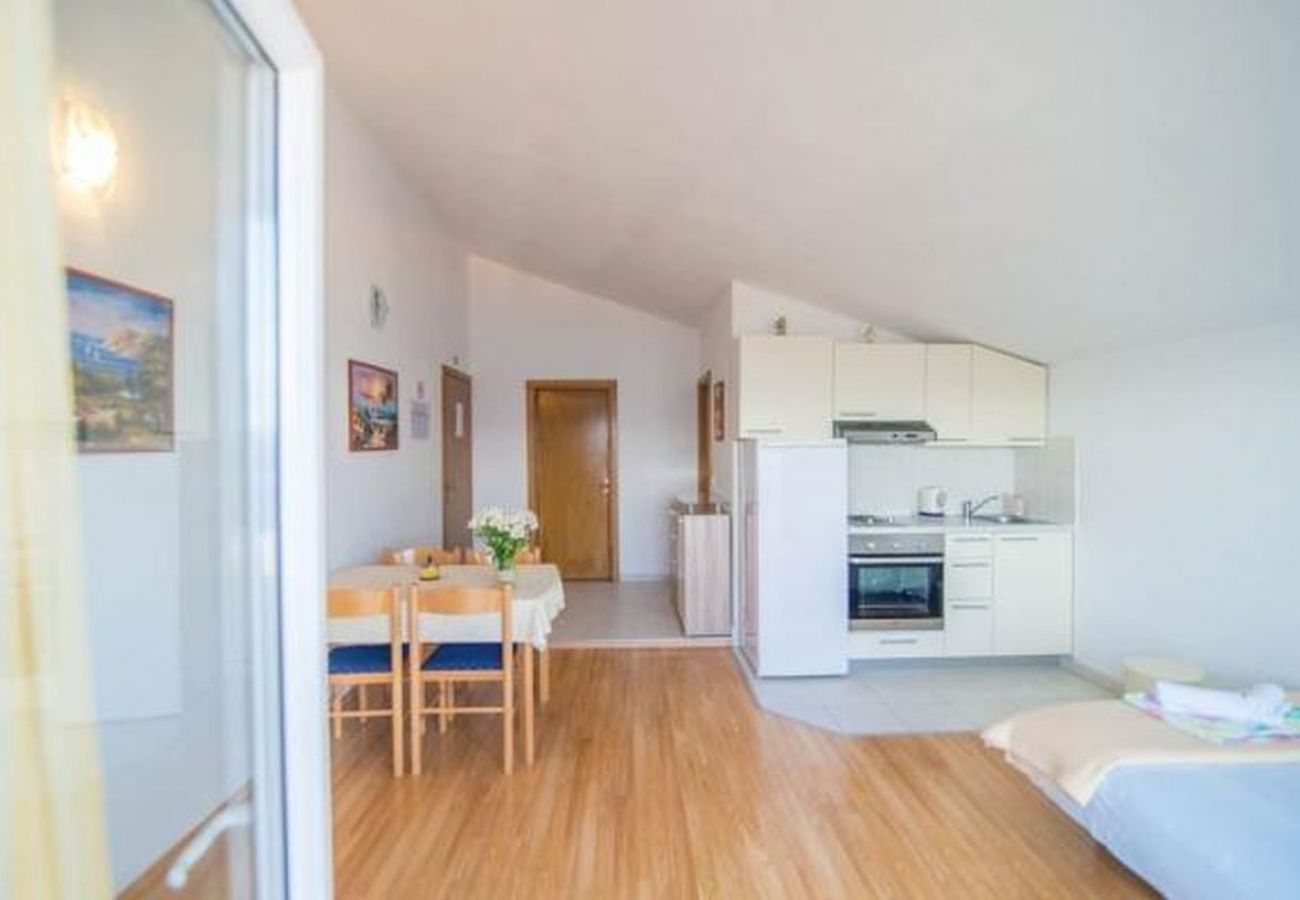 Appartement à Dugi Rat - Appartement dans Dugi Rat avec vue mer, terrasse, Climatisation, WIFI (5113-4)