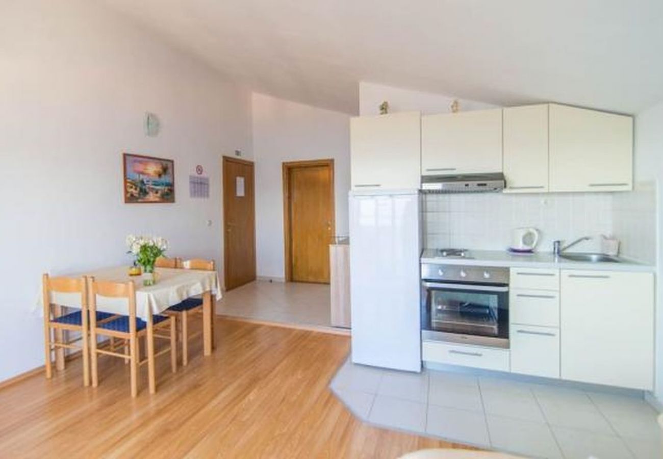 Appartement à Dugi Rat - Appartement dans Dugi Rat avec vue mer, terrasse, Climatisation, WIFI (5113-4)