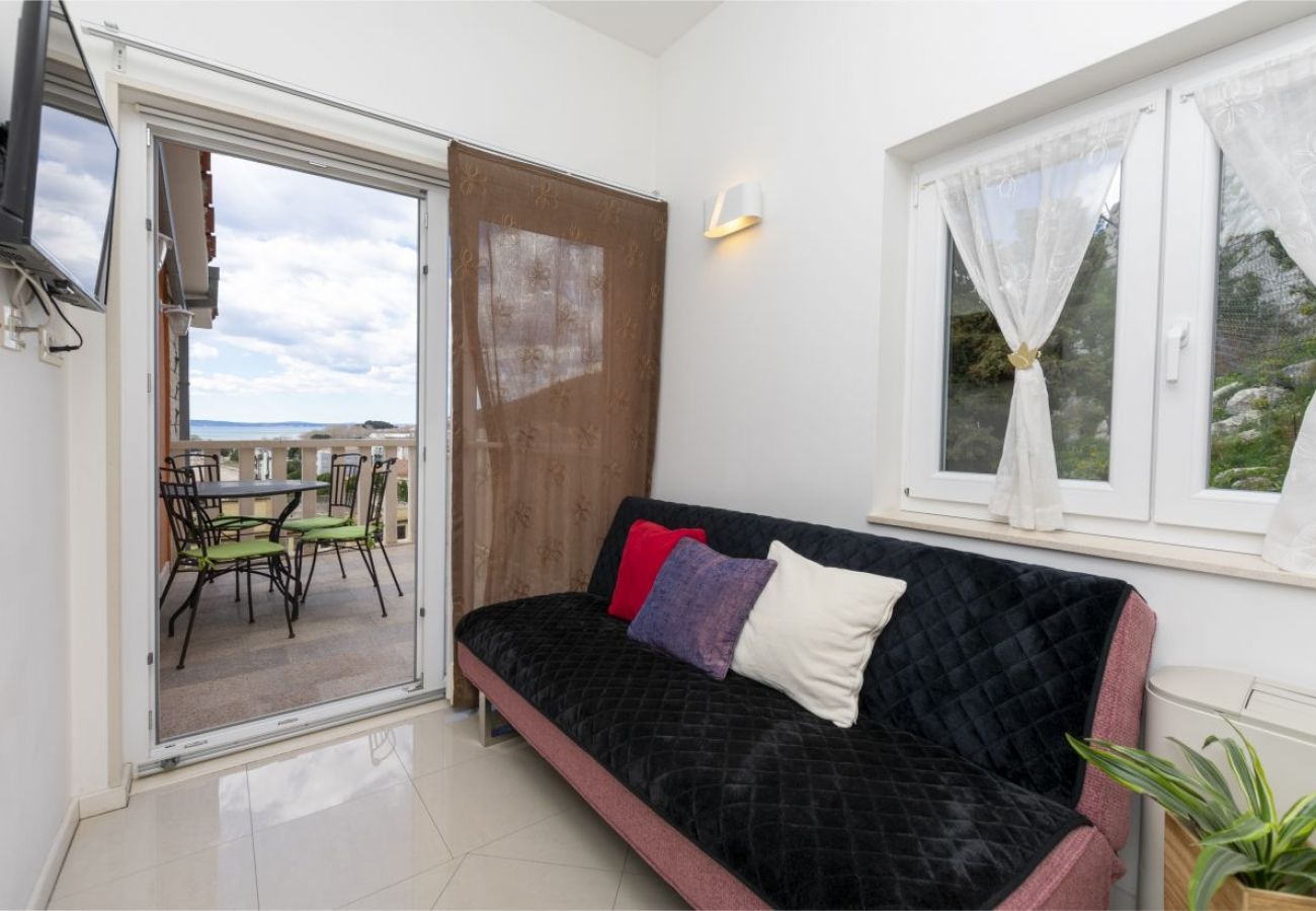 Appartement à Omiš - Appartement dans Omiš avec vue mer, Balcon, Climatisation, WIFI (5129-5)