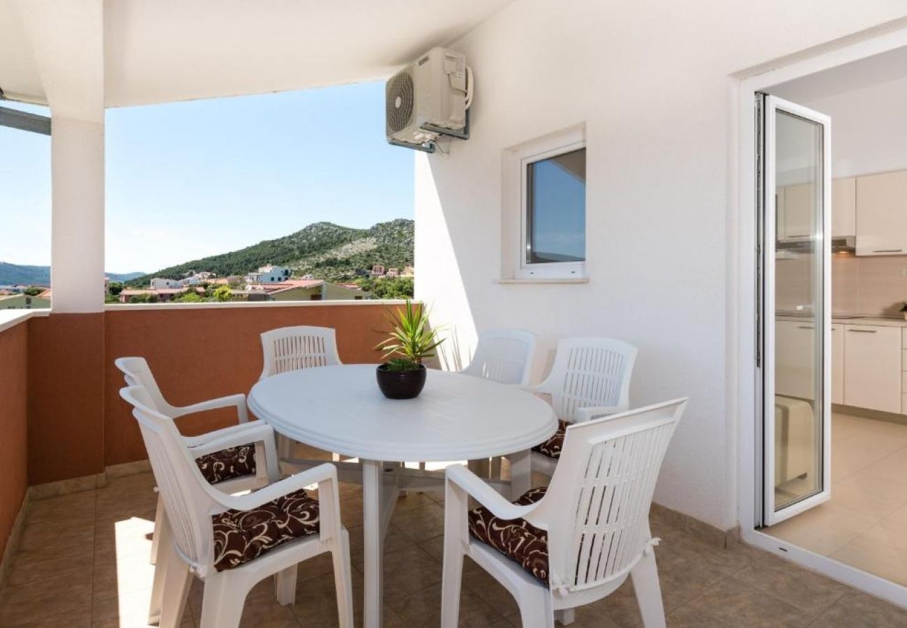 Appartement à Seget Vranjica - Appartement dans Seget Vranjica avec vue mer, terrasse, Climatisation, WIFI (5142-4)