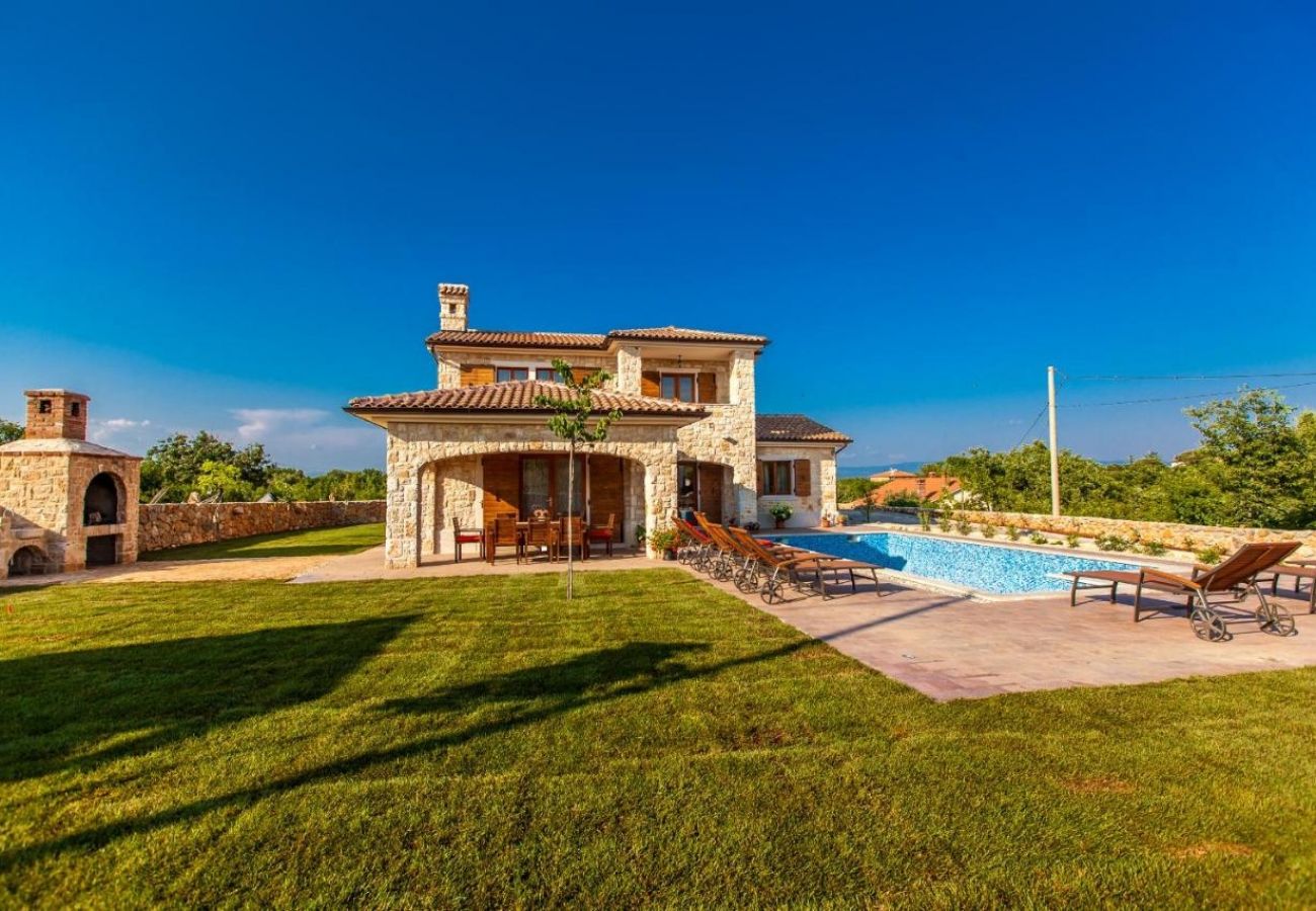 Maison à Vrbnik - Maison de vacances dans Vrbnik avec terrasse, Climatisation, WIFI, Machine à laver (5210-1)