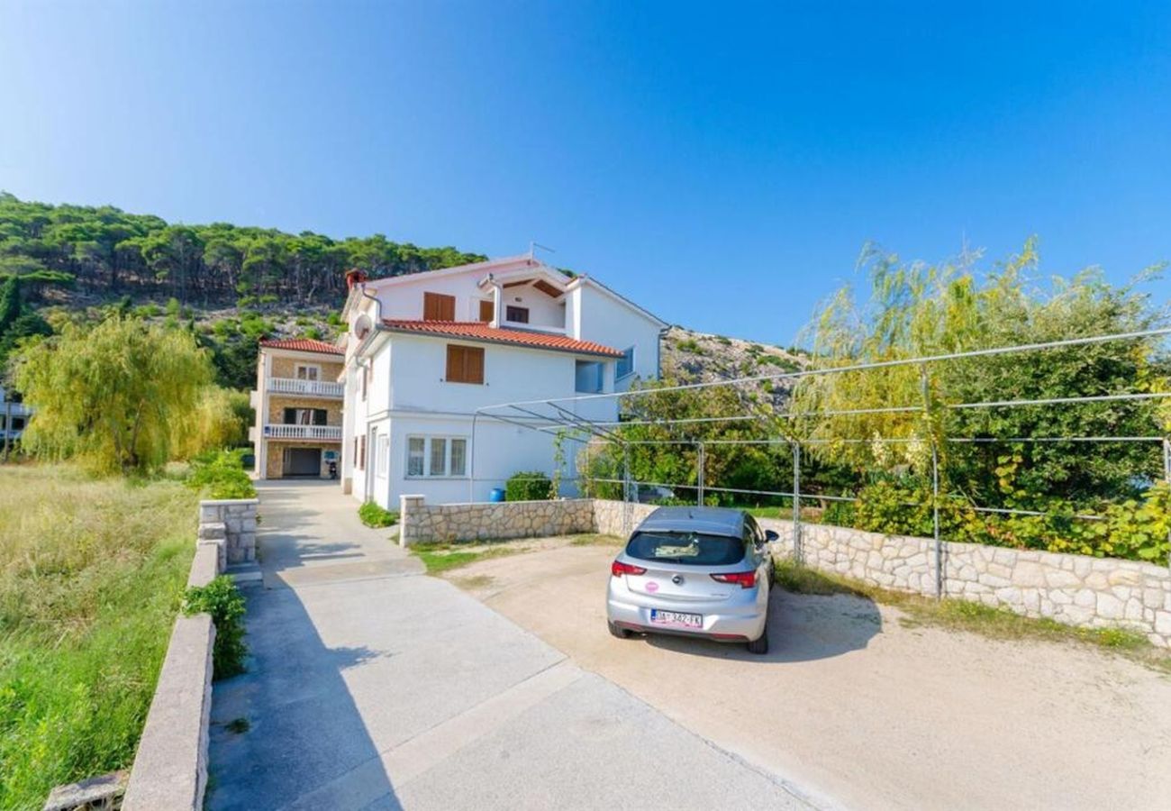 Appartement à Lopar - Appartement à Lopar avec vue sur la mer, balcon, climatisation, Wi-Fi (4419-4)