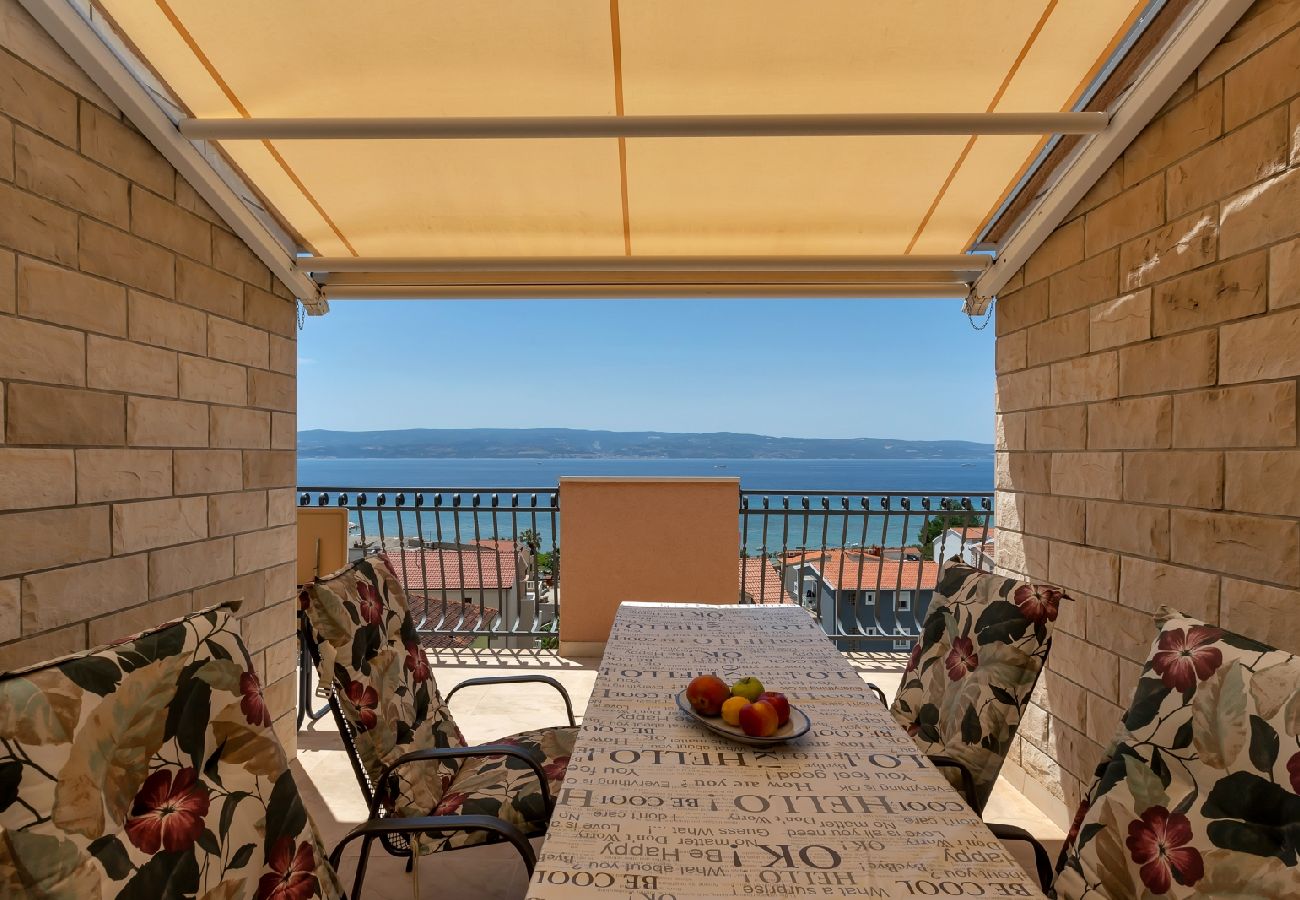 Affitto per camere a Duce - Camera in Duće con vista mare, balcone, Climatizzazione, WIFI (79-1)