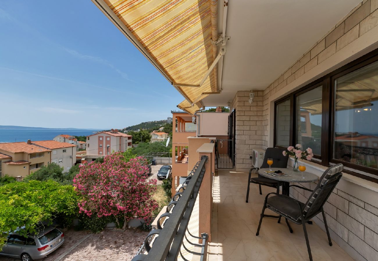 Affitto per camere a Duce - Camera in Duće con vista mare, balcone, Climatizzazione, WIFI (79-2)