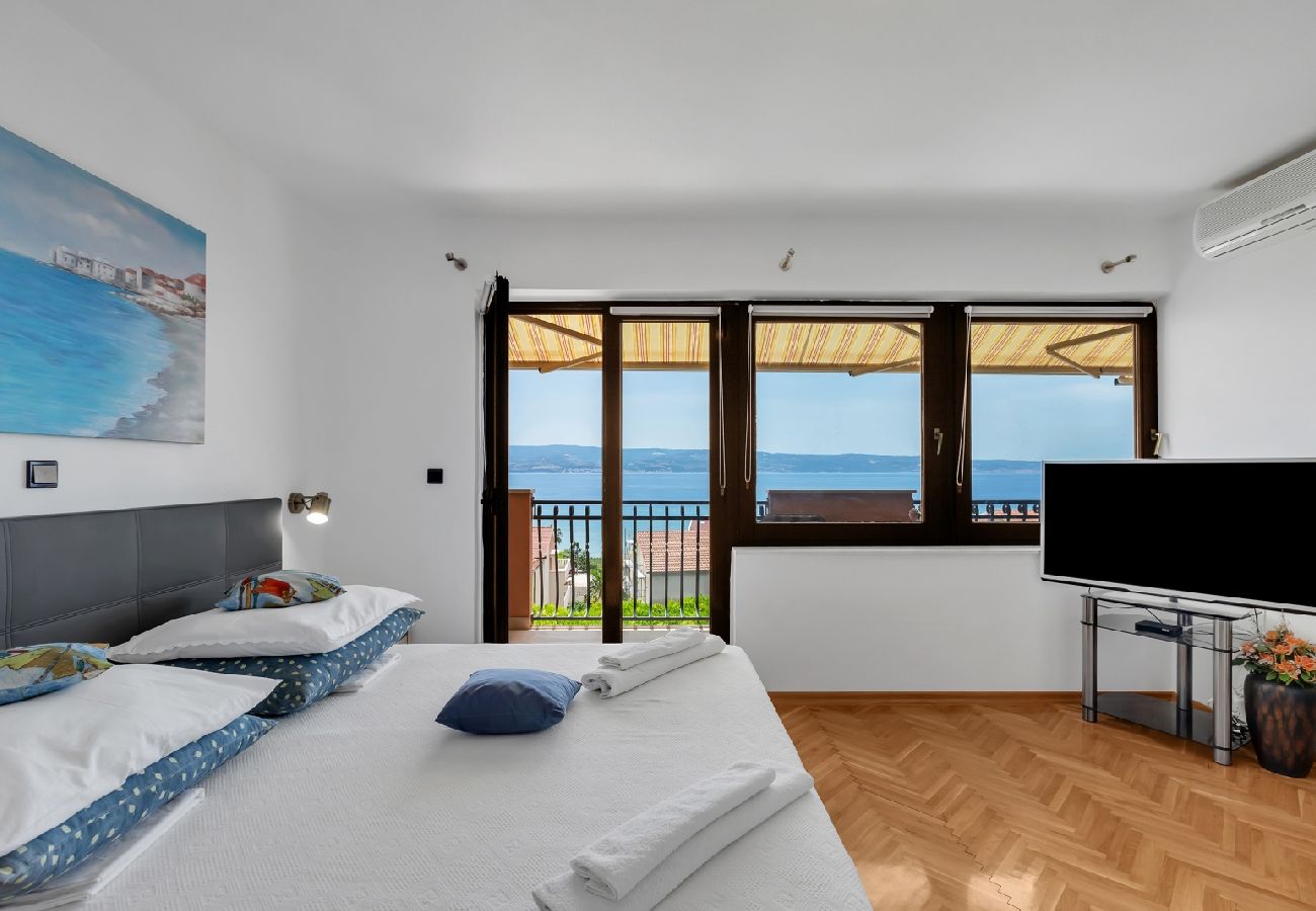 Affitto per camere a Duce - Camera in Duće con vista mare, balcone, Climatizzazione, WIFI (79-2)