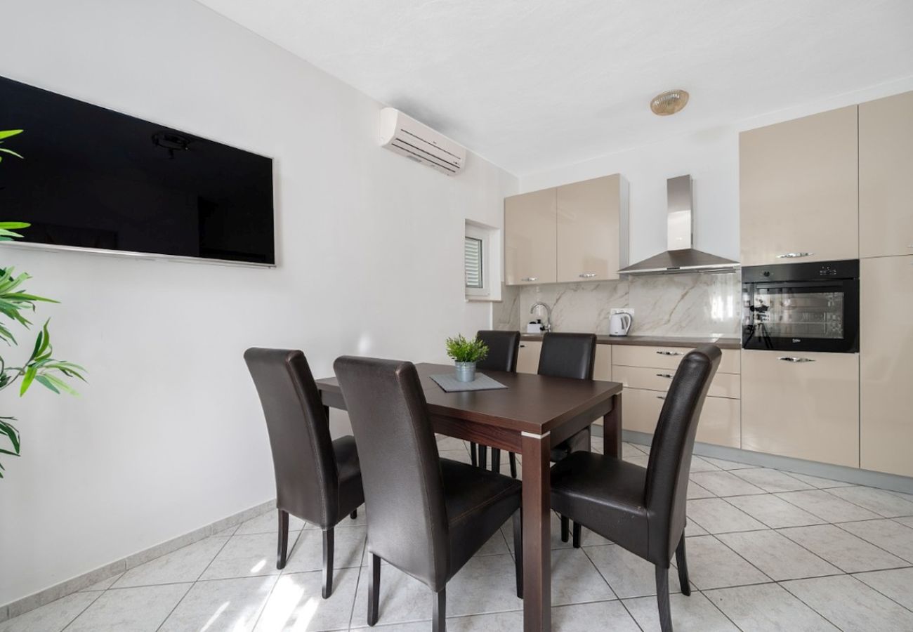 Appartamento a Duce - Appartamento in Duće con vista mare, terrazzo, Climatizzazione, WIFI (3423-3)