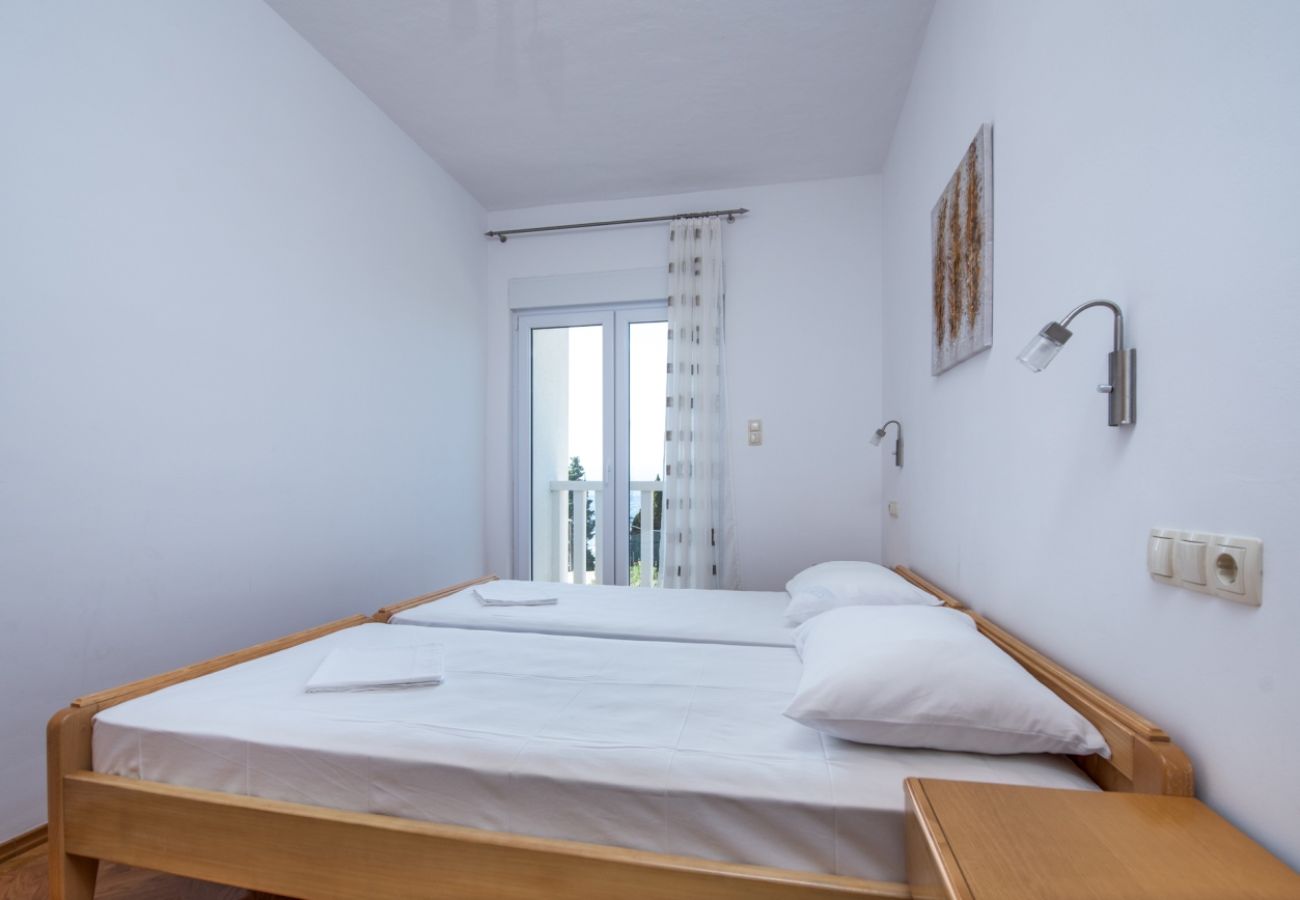 Appartamento a Duce - Appartamento in Duće con vista mare, terrazzo, Climatizzazione, WIFI (3423-3)