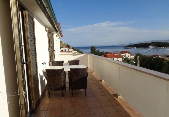 Appartamento a Lopar - Appartamento in Loparo (Lopar) con vista mare, terrazzo, WIFI (824-3) Appartamento a Lopar - Appartamento in Loparo (Lopar) con vista mare, terrazzo, WIFI (824-3)