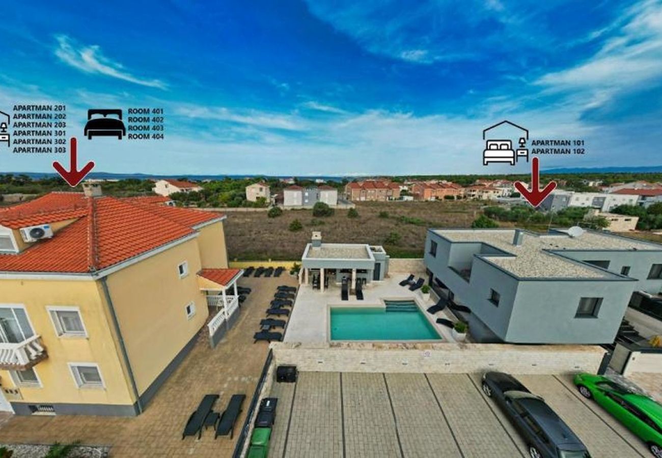 Affitto per camere a Nin - Camera in Zaton (Zadar) con vista mare, terrazzo, WIFI, Lavatrice (4141-7)