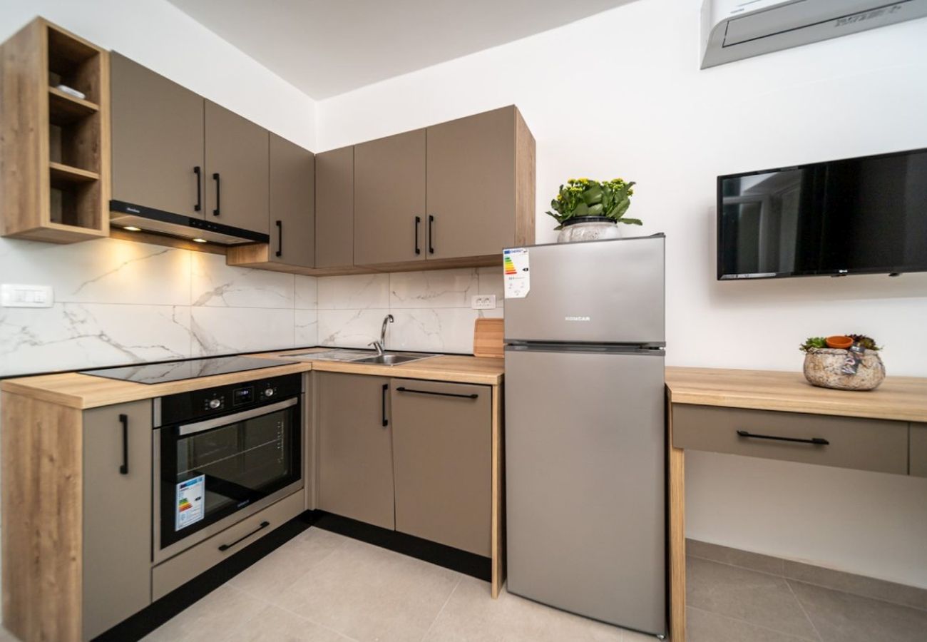 Appartamento a Rab - Appartamento in Barbat con vista mare, balcone, Climatizzazione (660-5) Appartamento a Rab - Appartamento in Barbat con vista mare, balcone, Climatizzazione (660-5)