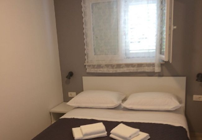 Appartamento a Podgora - Appartamento in Podgora con vista mare, terrazzo, Climatizzazione, WIFI (4492-3) Appartamento a Podgora - Appartamento in Podgora con vista mare, terrazzo, Climatizzazione, WIFI (4492-3)