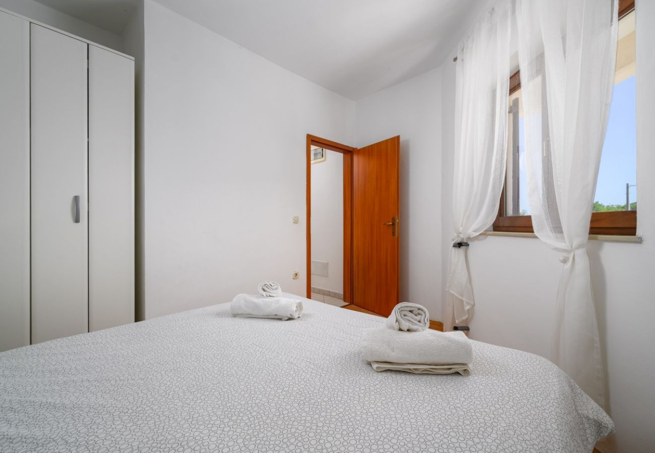 Appartamento a Drenje - Appartamento per vacanze a Drenje con vista mare, terrazza, aria condizionata, Wi-Fi (5235-2)