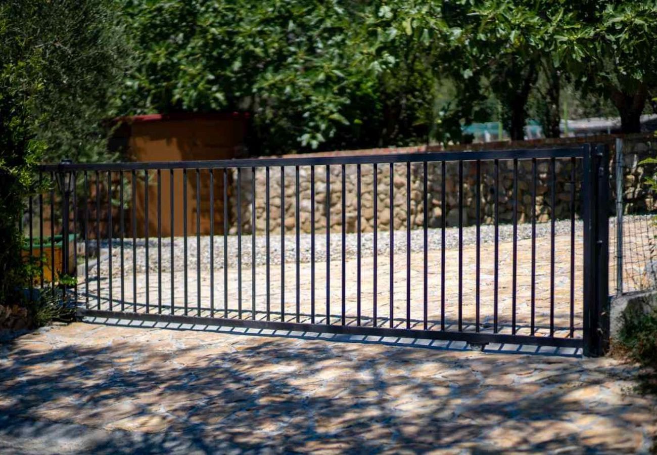 Casa a Mundanije - Casa vacanze a Mundanije con giardino, jacuzzi, terrazza, aria condizionata e lavatrice (5238-1)