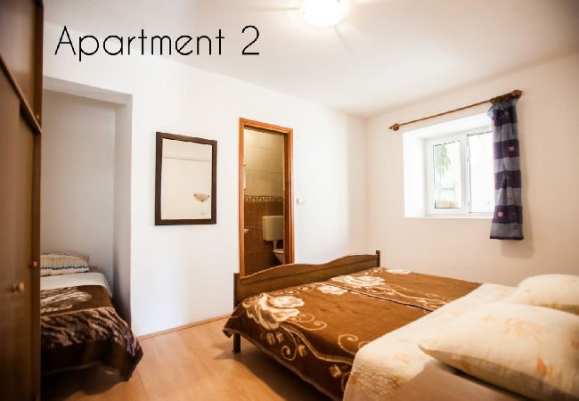 Apartament w Lopar - Apartament w Lopar z Widok na morze, taras, WIFI, Pralka (186-2) Apartament w Lopar - Apartament w Lopar z Widok na morze, taras, WIFI, Pralka (186-2)