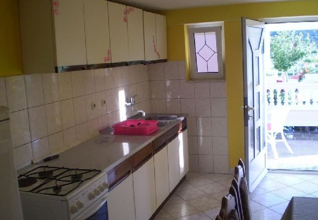 Apartament w Kampor - Apartament w Kampor z taras, WIFI (4235-4) Apartament w Kampor - Apartament w Kampor z taras, WIFI (4235-4)