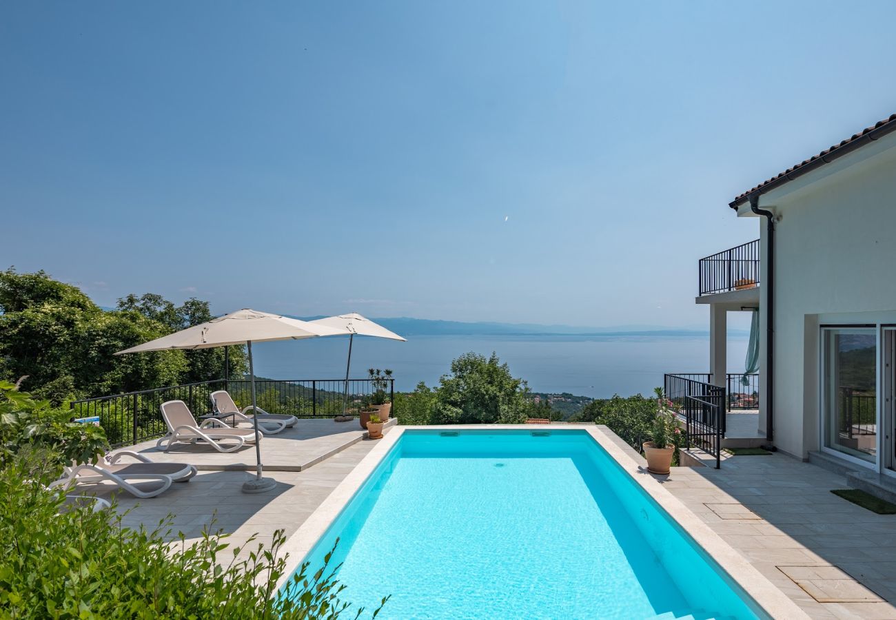 Dom w Icici - Domek wypoczynkowy w Ičići z Widok na morze, balkon, Klimatyzacja, WIFI (4683-1)