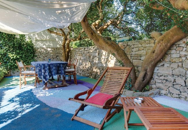 Dom w Mali Lošinj - Domek wypoczynkowy w Mali Lošinj z taras, Klimatyzacja, WIFI, Pralka (4780-1) Dom w Mali Lošinj - Domek wypoczynkowy w Mali Lošinj z taras, Klimatyzacja, WIFI, Pralka (4780-1)