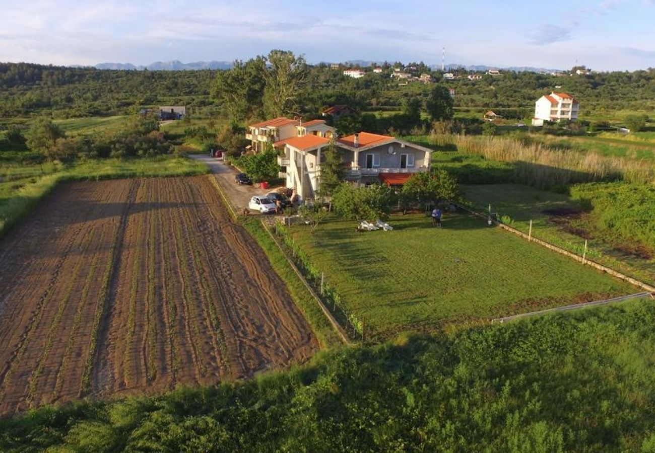 Dom w Ljubac - Domek wypoczynkowy w Ljubač z Widok na morze, taras, Klimatyzacja, WIFI (4851-1)