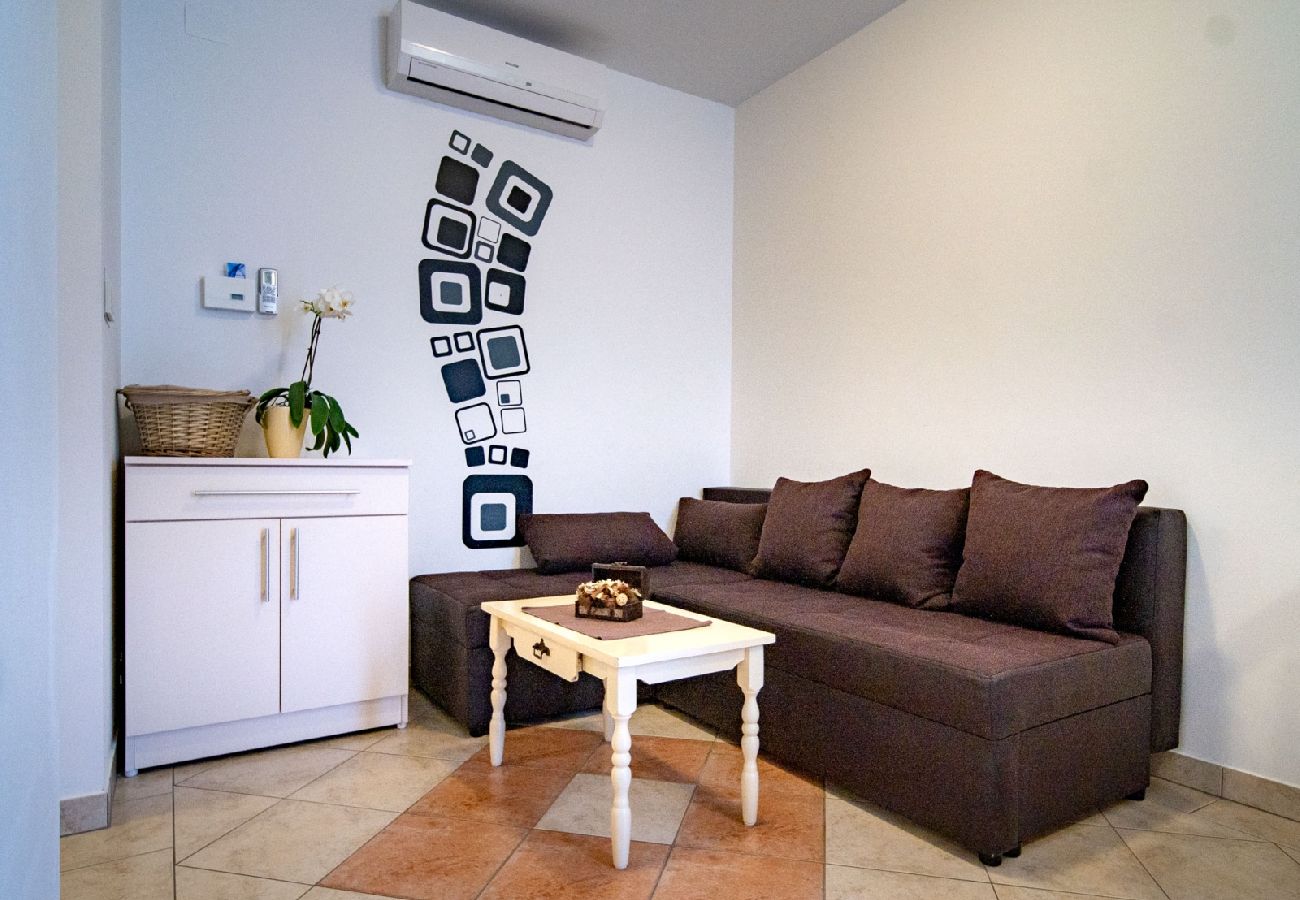 Apartament w Lopar - Apartament w Lopar z taras, Klimatyzacja, WIFI, Pralka (4885-4)