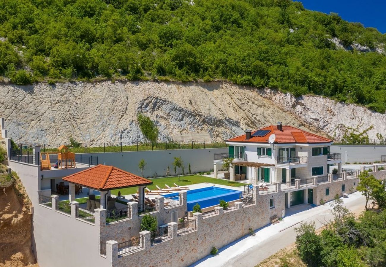 Dom w Imotski - Ferienhaus in Imotski mit Terrasse, Klimaanlage, W-LAN, Waschmaschine (4978-1)