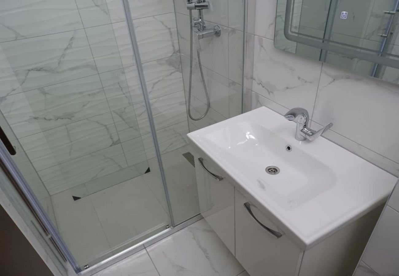 Apartament w Duce - Apartament w Duće z Widok na morze, taras, Klimatyzacja, WIFI (5064-1)