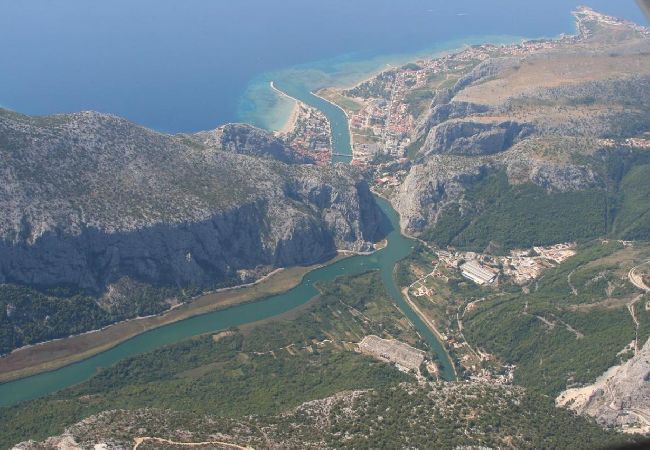 Dom w Omiš - Domek wypoczynkowy w Omiš z taras, Klimatyzacja, WIFI, Pralka (5202-1) Dom w Omiš - Domek wypoczynkowy w Omiš z taras, Klimatyzacja, WIFI, Pralka (5202-1)