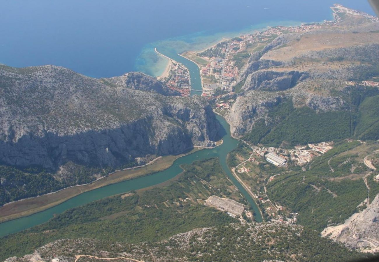 Dom w Omiš - Domek wypoczynkowy w Omiš z taras, Klimatyzacja, WIFI, Pralka (5202-1)