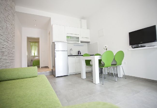 Апартаменты на Duce - Ferienwohnung in Duće mit Meerblick, Terrasse, Klimaanlage, W-LAN (850-1) Апартаменты на Duce - Ferienwohnung in Duće mit Meerblick, Terrasse, Klimaanlage, W-LAN (850-1)