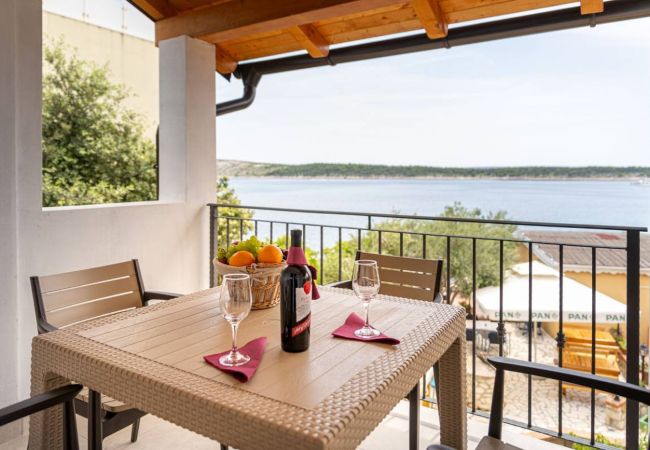 Апартаменты на Rab - Ferienwohnung in Barbat mit Meerblick, Balkon, Klimaanlage (660-5) Апартаменты на Rab - Ferienwohnung in Barbat mit Meerblick, Balkon, Klimaanlage (660-5)