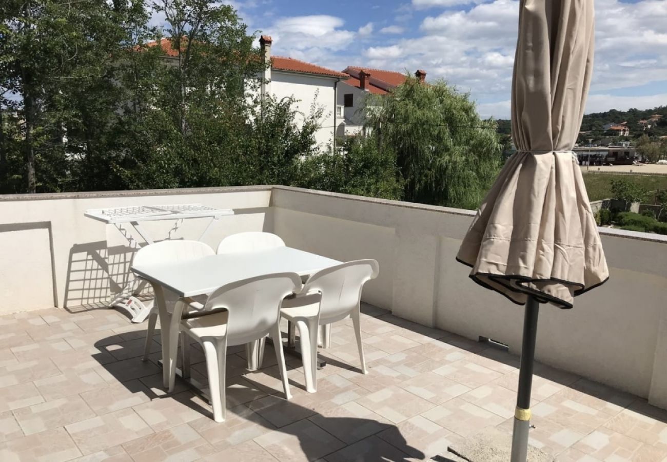 Апартаменты на Lopar - Ferienwohnung in Lopar mit Meerblick, Terrasse, Klimaanlage, W-LAN (4607-2)