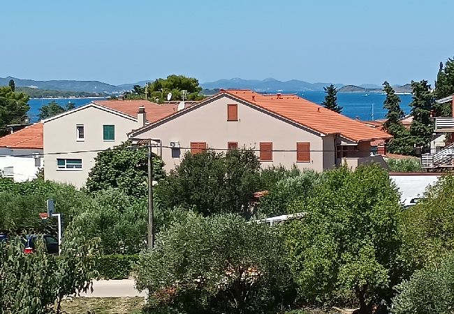Апартаменты на Biograd na moru - Aпартамент в Биоград-на-Мору c Вид на море, балкон, Спутниковое / кабельное телевидение, WIFI (4818-4) Апартаменты на Biograd na moru - Aпартамент в Биоград-на-Мору c Вид на море, балкон, Спутниковое / кабельное телевидение, WIFI (4818-4)