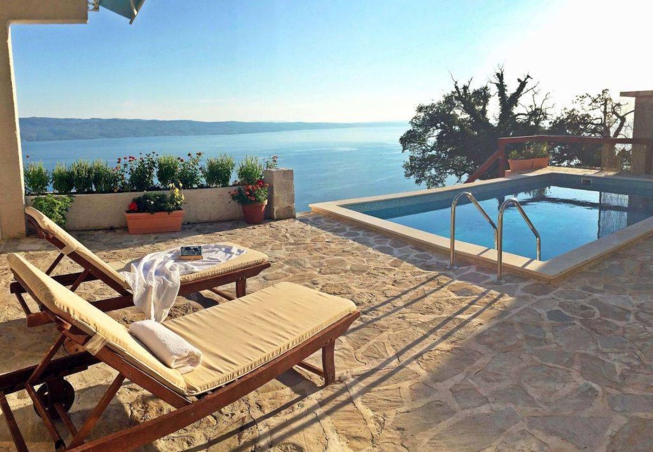 Дом на Dugi Rat - дом отдыха в Sumpetar Jesenice c Вид на море, терраса, Спутниковое / кабельное телевидение, WIFI (5133-1)