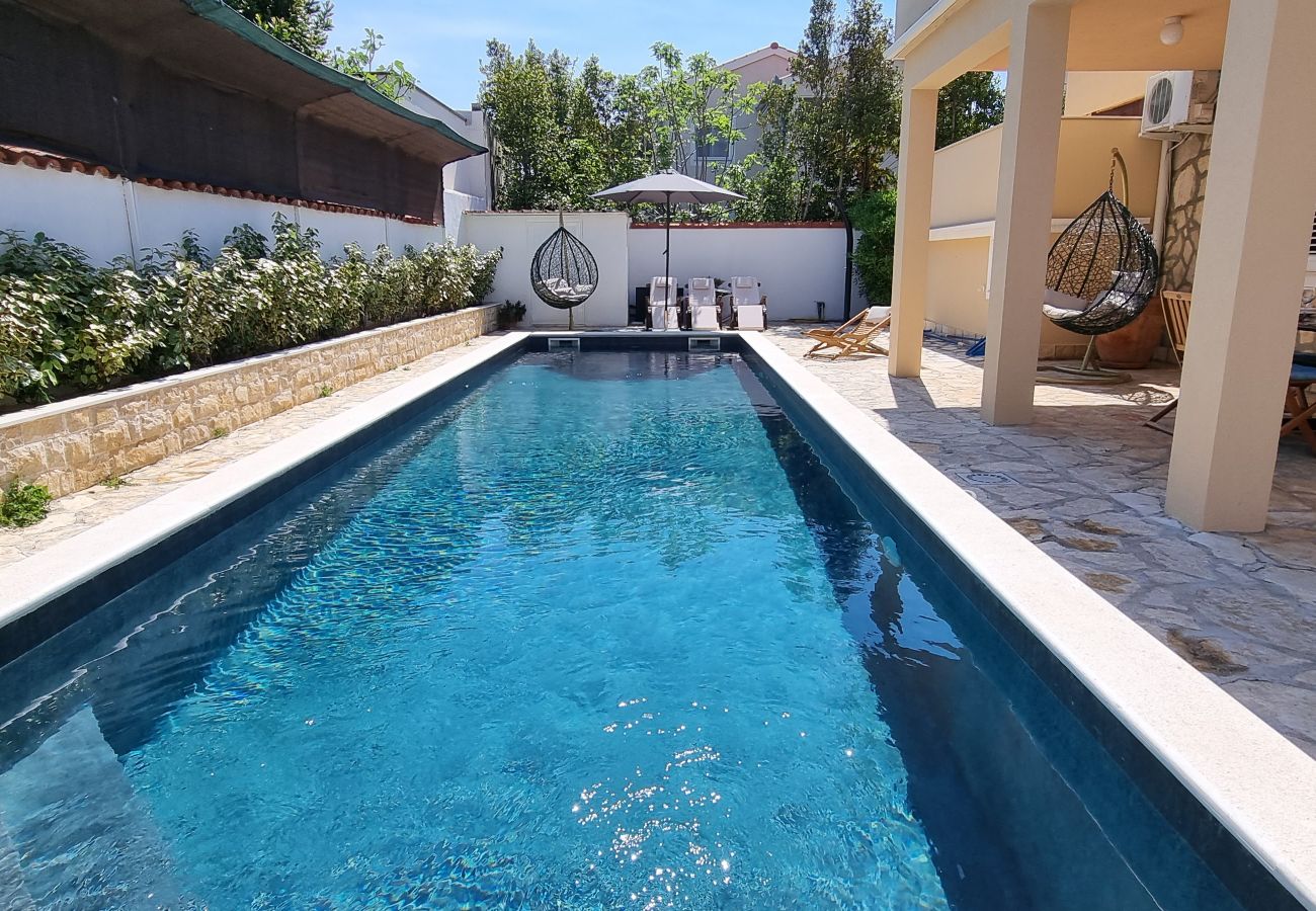 Апартаменты на Privlaka - Apartment 5237-1 for 6+1 Pers. in Privlaka